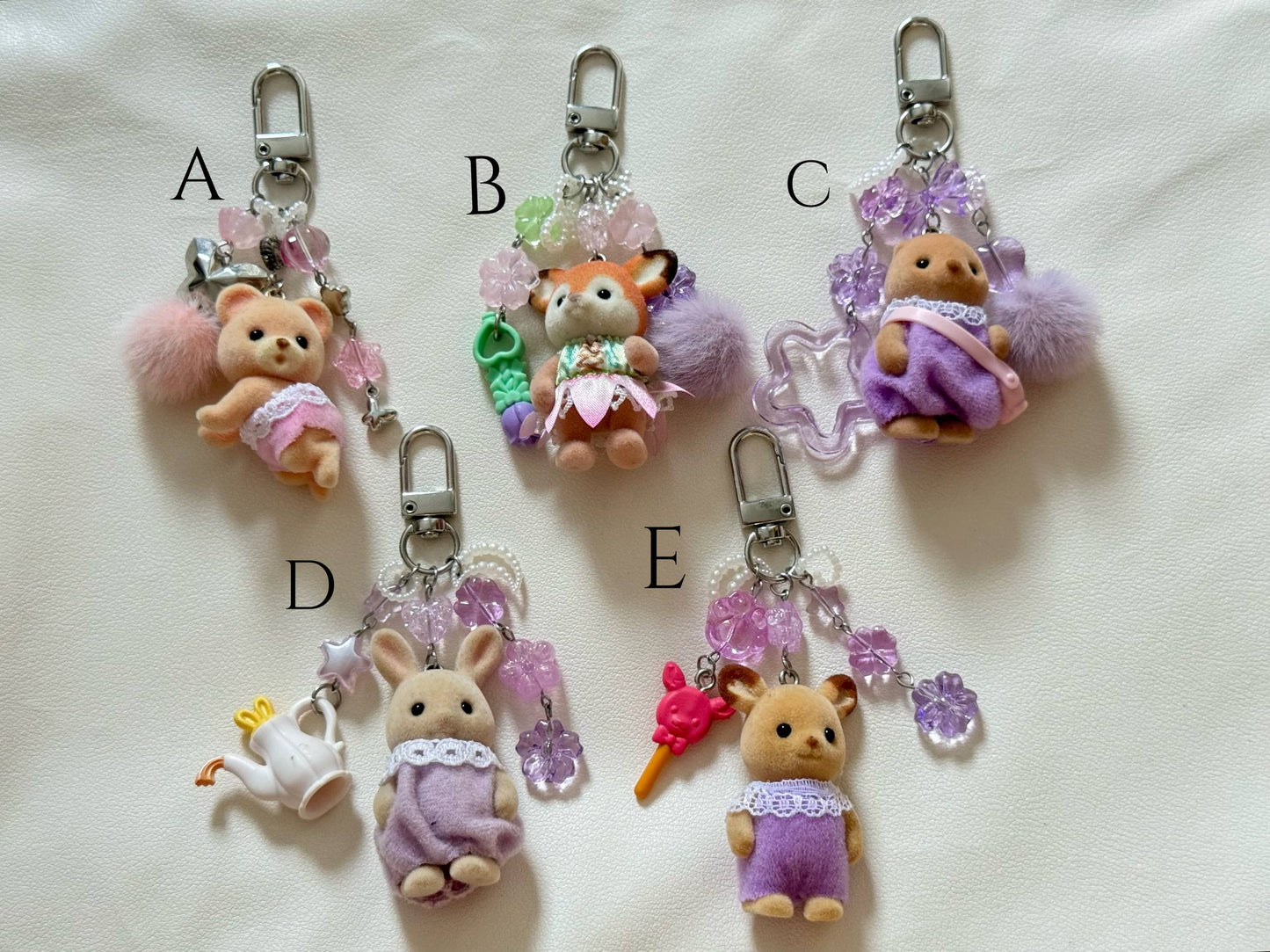 sylvanian families keyring ( pinks and purples)